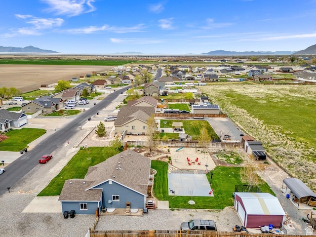 4104 Rose Springs Rd Unit 406, Erda, UT 84074 - drone / aerial view with a residential view and a mountain view