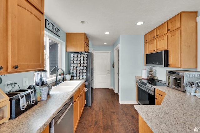 4104 Rose Springs Rd Unit 406, Erda, UT 84074 - kitchen featuring dark wood-style floors, a sink, recessed lighting, light countertops, and appliances with stainless steel finishes