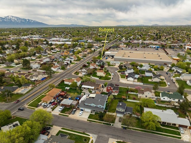 bird's eye view featuring a mountain view and a residential view