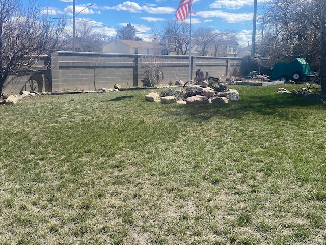 view of yard with fence