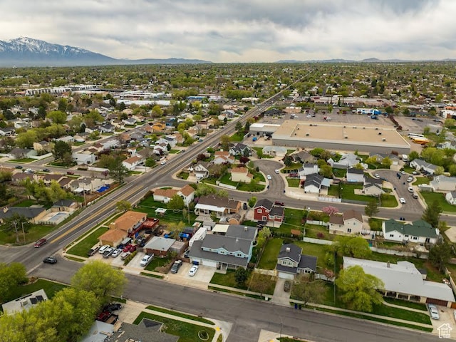 birds eye view of property with a residential view and a mountain view