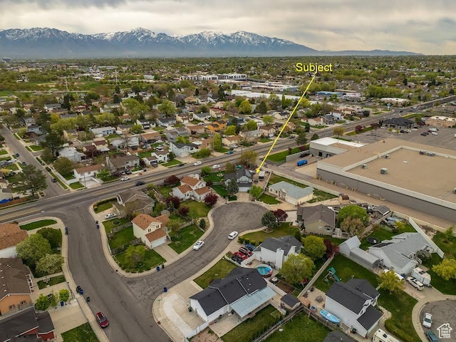 bird's eye view with a residential view and a mountain view