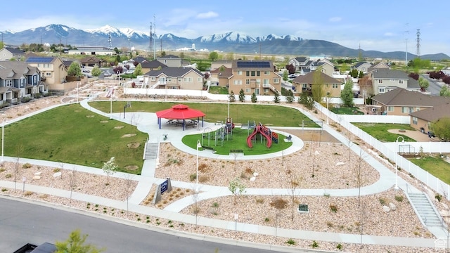 view of home's community with a gazebo, a residential view, and a mountain view