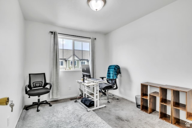 office space featuring baseboards and carpet floors
