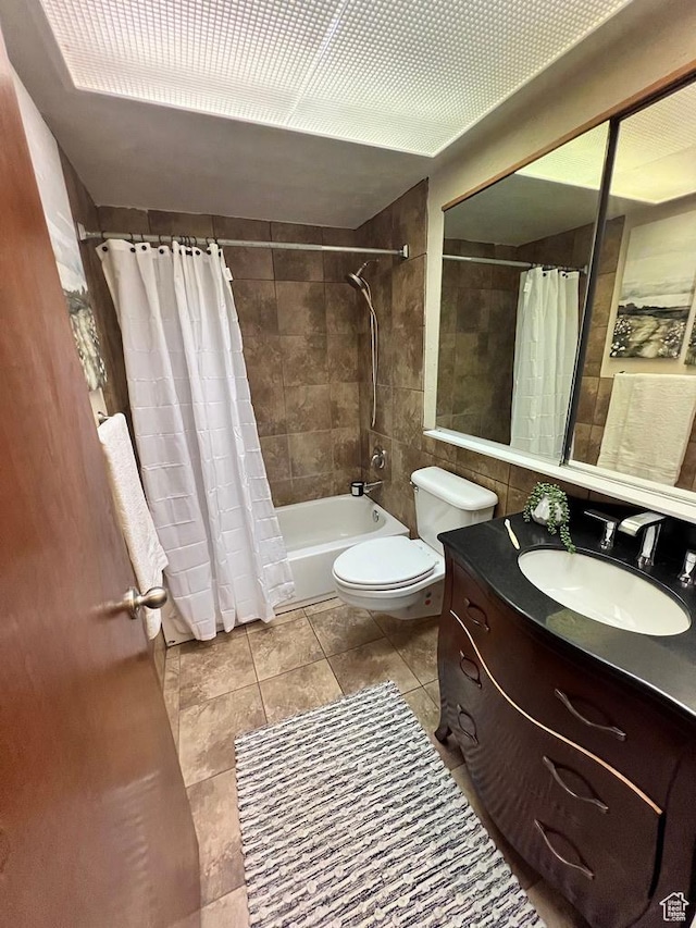 635 N 1200 W Unit A-306, Salt Lake City, UT 84116 - bathroom with tile patterned floors, shower / bath combo with shower curtain, vanity, and toilet