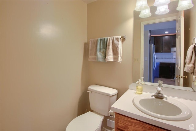 half bath with toilet and vanity