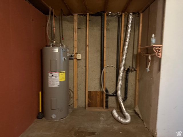 utility room featuring electric water heater