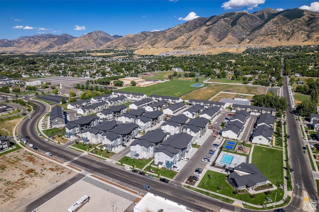drone / aerial view featuring a mountain view and a residential view