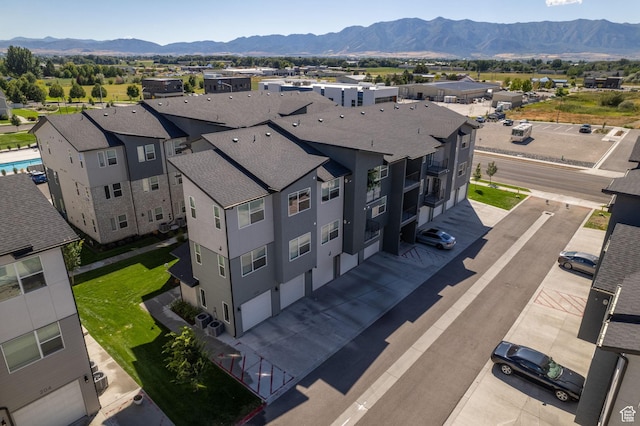 bird's eye view featuring a residential view and a mountain view
