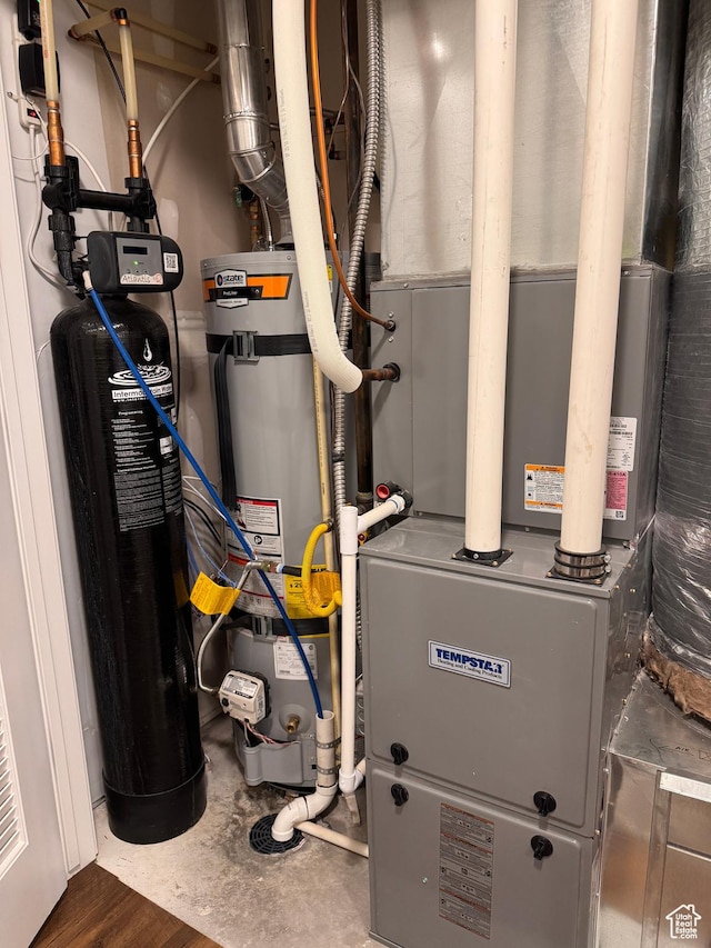 utilities featuring heating unit and secured water heater