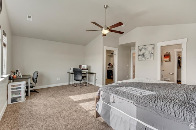 8459 N Western Gailes Dr, Eagle Mountain, UT 84005 - carpeted bedroom with vaulted ceiling, a spacious closet, baseboards, ensuite bath, and visible vents
