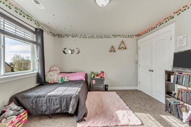 8459 N Western Gailes Dr, Eagle Mountain, UT 84005 - bedroom featuring a closet, visible vents, and carpet