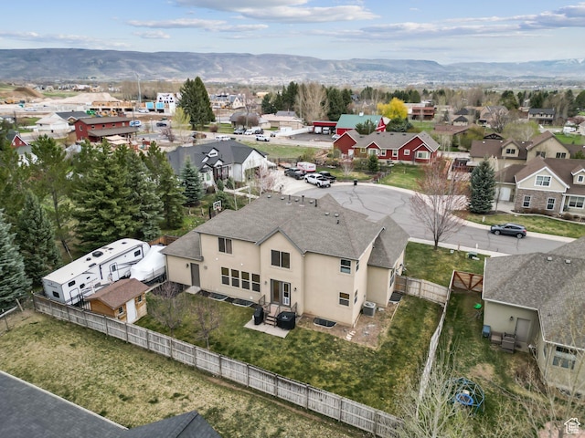bird's eye view featuring a residential view and a mountain view