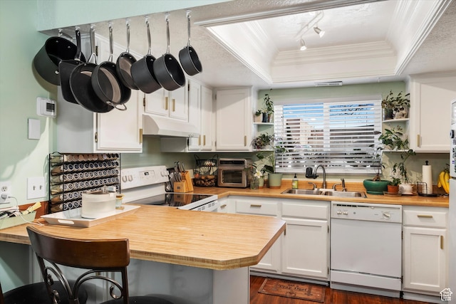 kitchen featuring a sink, white appliances, crown molding, open shelves, and under cabinet range hood