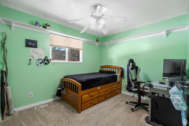 bedroom with carpet floors, a ceiling fan, visible vents, and baseboards