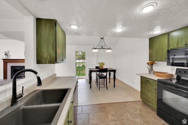 2590 W Central Pk Cir, Taylorsville, UT 84129 - kitchen featuring green cabinetry, black appliances, a textured ceiling, hanging light fixtures, and light countertops