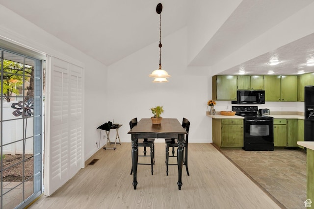 2590 W Central Pk Cir, Taylorsville, UT 84129 - dining space with light wood finished floors and high vaulted ceiling