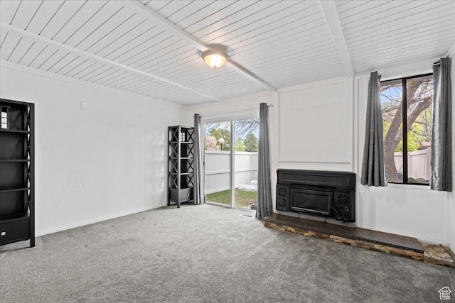 4216 S Solitude Rdg Unit A, Taylorsville, UT 84129 - unfurnished living room with beamed ceiling, wood ceiling, carpet flooring, and baseboards