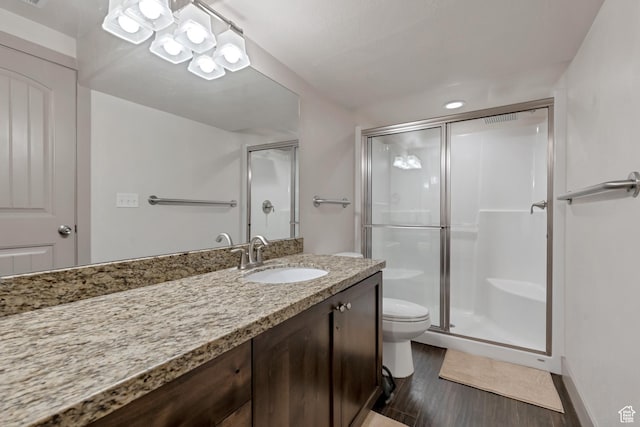 11113 S Cadbury Dr, South Jordan, UT 84095 - full bath featuring a shower stall, toilet, vanity, and wood finished floors