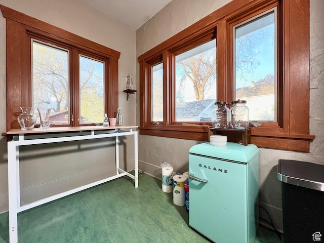 interior space with baseboards