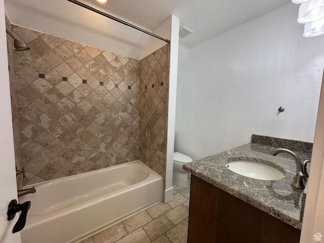 bathroom with tub / shower combination, tile patterned floors, toilet, and vanity