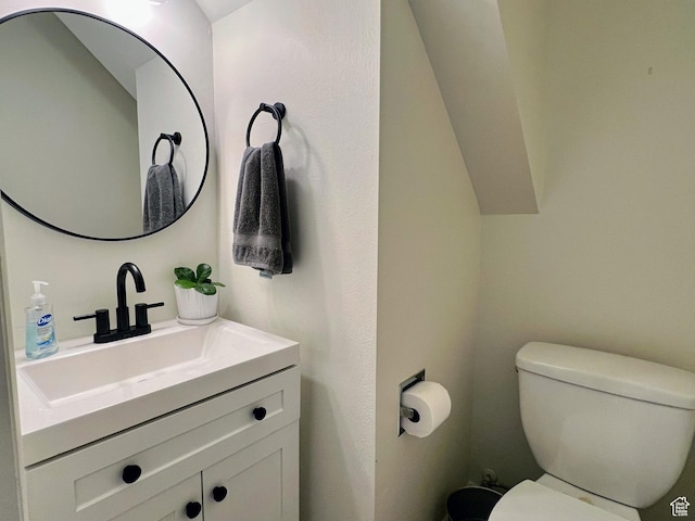 half bath with toilet and vanity