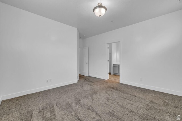 84 W Silver Springs Dr, Vineyard, UT 84059 - empty room featuring baseboards and carpet floors