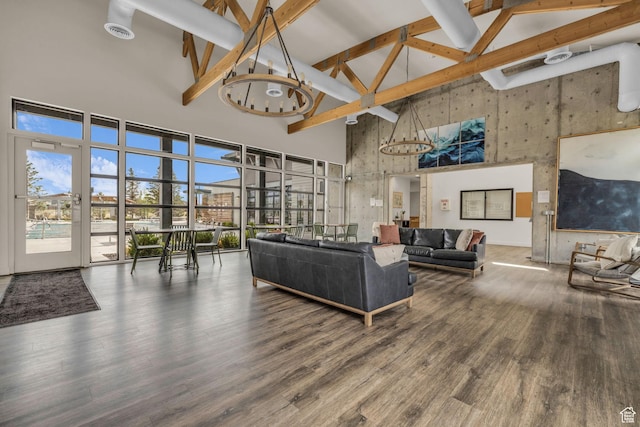 84 W Silver Springs Dr, Vineyard, UT 84059 - living area with beamed ceiling, a chandelier, wood finished floors, and high vaulted ceiling