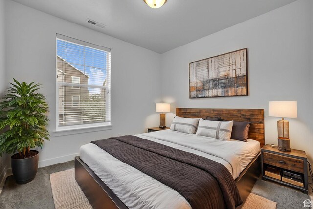 84 W Silver Springs Dr, Vineyard, UT 84059 - bedroom with baseboards, carpet flooring, and visible vents