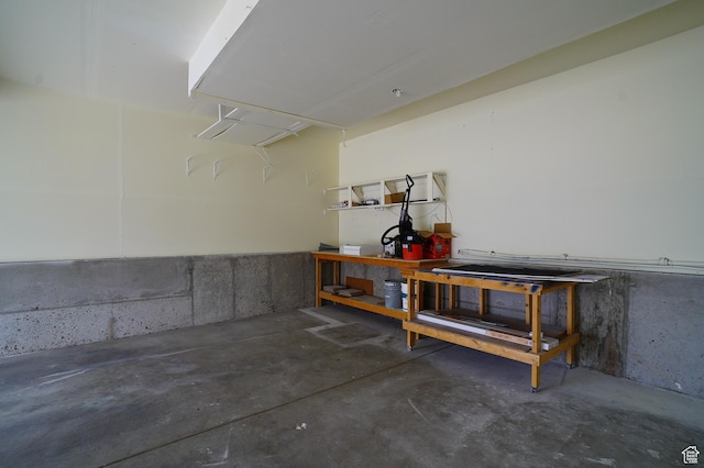 garage with a workshop area