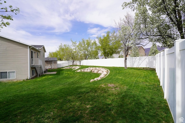 view of yard featuring stairs
