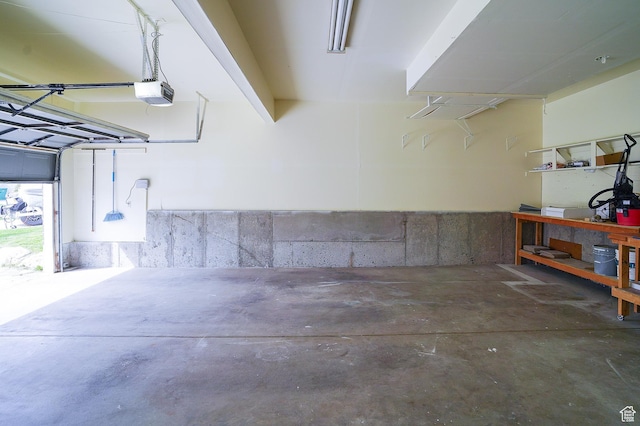 garage featuring a garage door opener