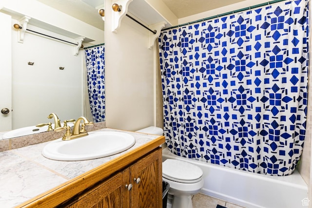 bathroom featuring shower / tub combo, toilet, and vanity