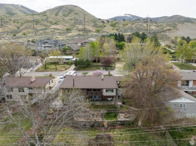 drone / aerial view with a mountain view and a residential view