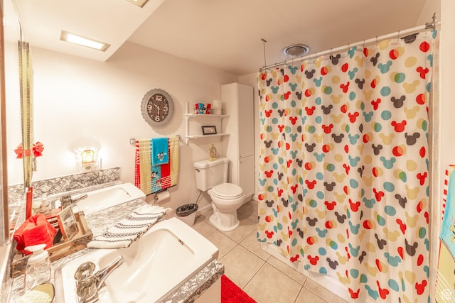 full bath with curtained shower, tile patterned floors, vanity, and toilet