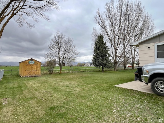 440 S 400 W, Preston, ID 83263 - view of yard featuring a storage unit, an outbuilding, and a fenced backyard