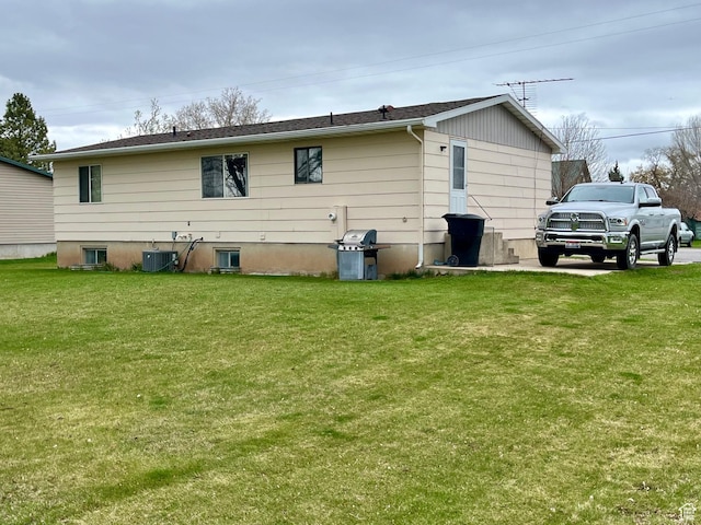 440 S 400 W, Preston, ID 83263 - rear view of property with central AC and a lawn