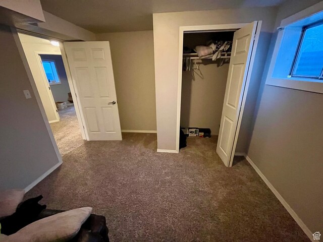 440 S 400 W, Preston, ID 83263 - unfurnished bedroom featuring baseboards, carpet flooring, and a closet