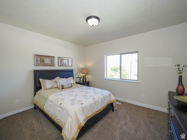 851 E Oak Ct Unit 28, Tooele, UT 84074 - carpeted bedroom featuring baseboards