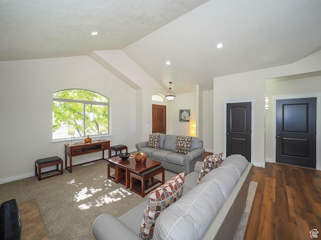 851 E Oak Ct Unit 28, Tooele, UT 84074 - living room featuring lofted ceiling, baseboards, recessed lighting, and dark wood-type flooring