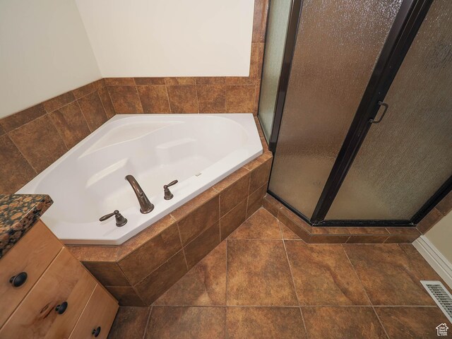 851 E Oak Ct Unit 28, Tooele, UT 84074 - full bath with a shower stall, a garden tub, and visible vents