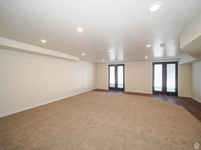 851 E Oak Ct Unit 28, Tooele, UT 84074 - spare room featuring recessed lighting, baseboards, french doors, and plenty of natural light