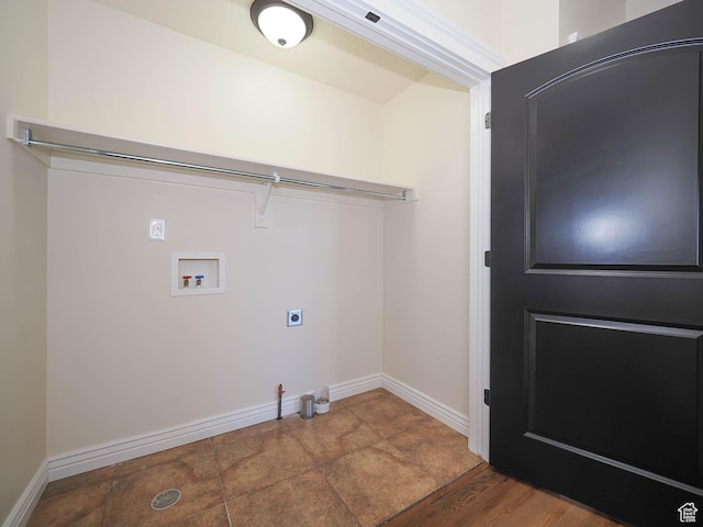 851 E Oak Ct Unit 28, Tooele, UT 84074 - clothes washing area featuring washer hookup, baseboards, electric dryer hookup, and laundry area
