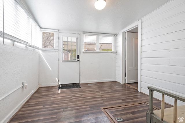 731 E Roosevelt Ave, Salt Lake City, UT 84105 - entryway featuring baseboards and dark wood-style flooring
