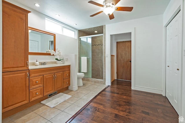731 E Roosevelt Ave, Salt Lake City, UT 84105 - full bath with a shower stall, toilet, a ceiling fan, and vanity
