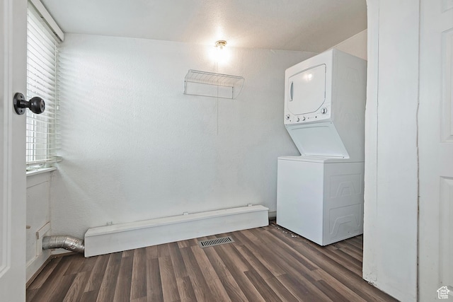 731 E Roosevelt Ave, Salt Lake City, UT 84105 - clothes washing area featuring wood finished floors, stacked washer and dryer, plenty of natural light, and visible vents