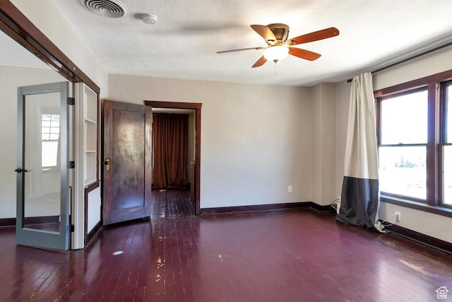 480 N 300 W, Salt Lake City, UT 84103 - unfurnished room featuring baseboards, visible vents, ceiling fan, and wood-type flooring
