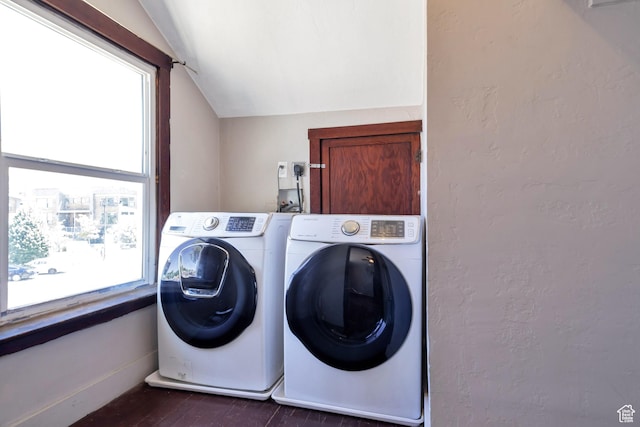 480 N 300 W, Salt Lake City, UT 84103 - clothes washing area with washing machine and clothes dryer, dark wood-style floors, laundry area, and a healthy amount of sunlight