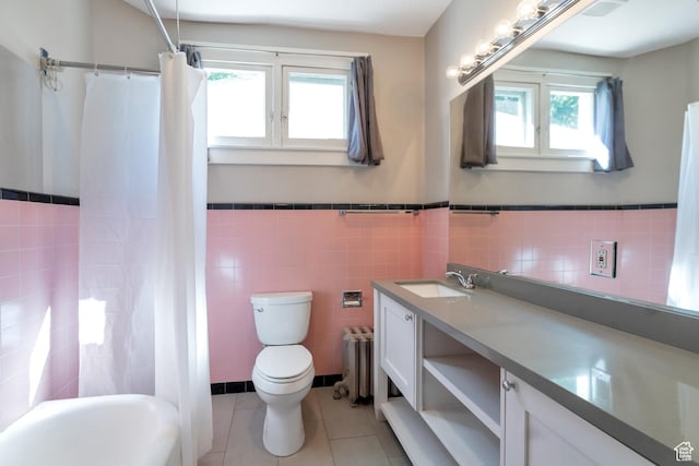 480 N 300 W, Salt Lake City, UT 84103 - full bath with tile walls, tile patterned floors, plenty of natural light, and toilet