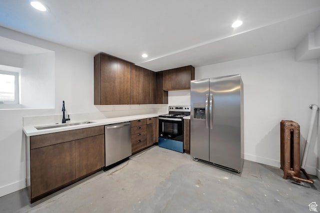 480 N 300 W, Salt Lake City, UT 84103 - kitchen with stainless steel appliances, a sink, baseboards, unfinished concrete flooring, and light countertops